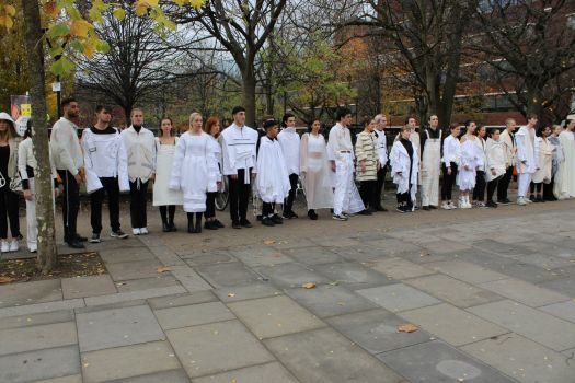 Models for Guerrilla Fashion Show outside All Saints Park. 